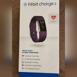 Fitbit Charge 2 Activity Tracker/Heart Rate Monitor And 5 replacement bands.
